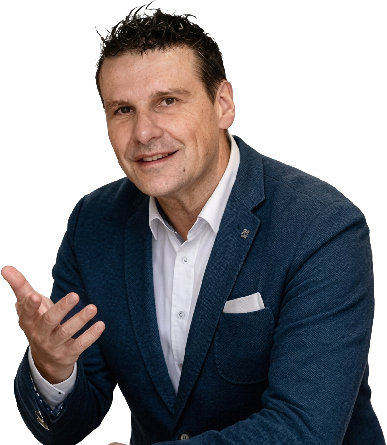Jean Lemmens van Ontslag Center legt met een uitleggend handgebaar een ontslag- of arbeidsrechtelijk vraagstuk uit — persoonlijk advies en korte lijnen.